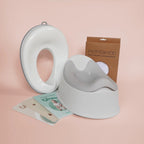 Komplett potträningskit med potta, toalettsits, frottéskydd, barnbok, kunskapsbok och pottdagbok.